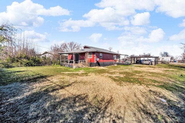 view of yard with a carport