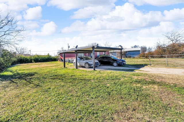 view of yard featuring a carport