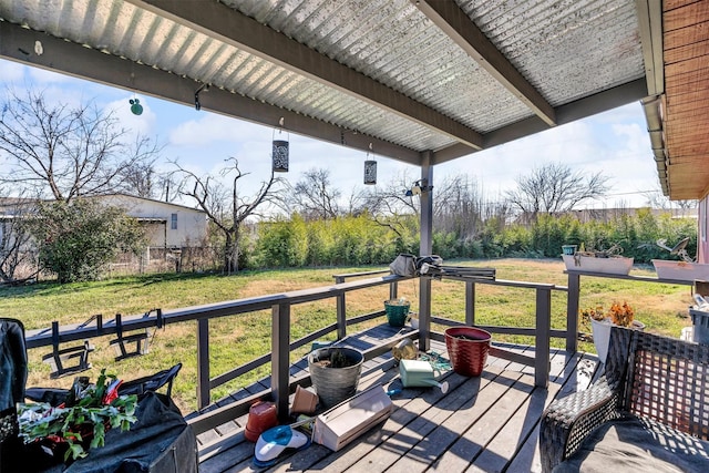 deck featuring a lawn