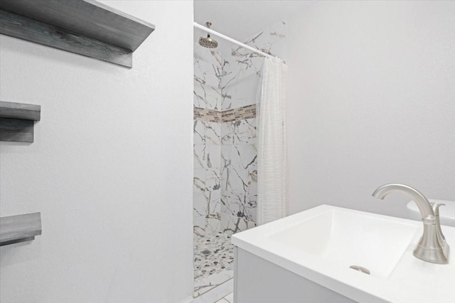 bathroom featuring sink and walk in shower