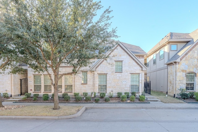 8713 Whitehead St, Mckinney, TX 75070 - view of front facade featuring stone siding