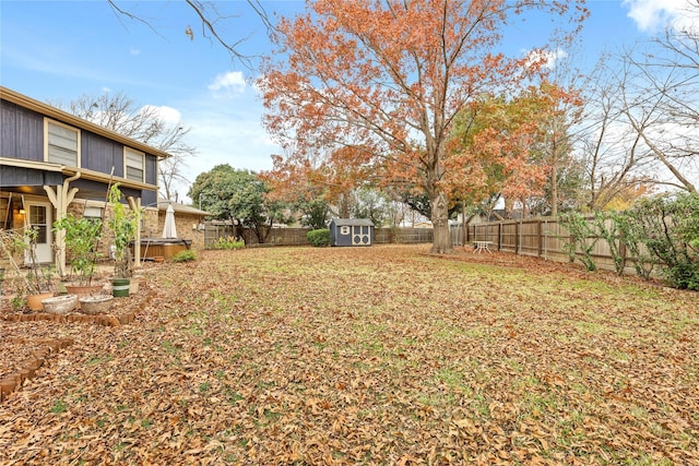 view of yard featuring a storage shed