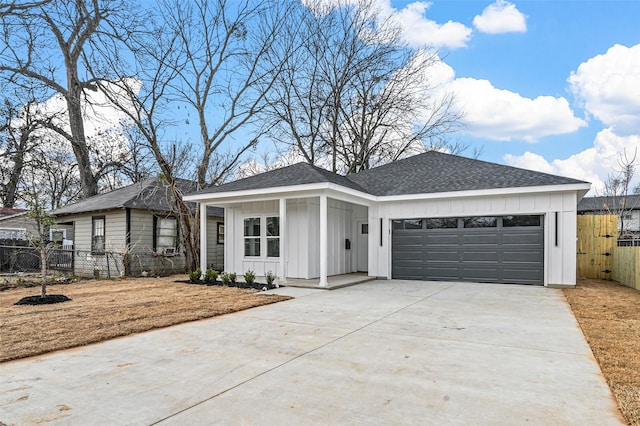 ranch-style house featuring a garage