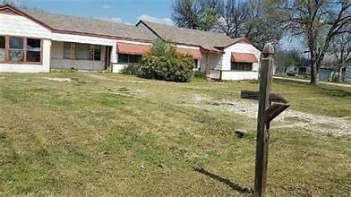 exterior space with a front lawn