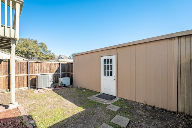 view of outbuilding featuring central AC unit