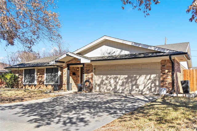 ranch-style house featuring a garage