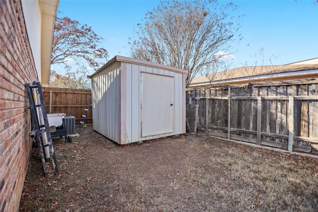 view of outdoor structure featuring central AC unit