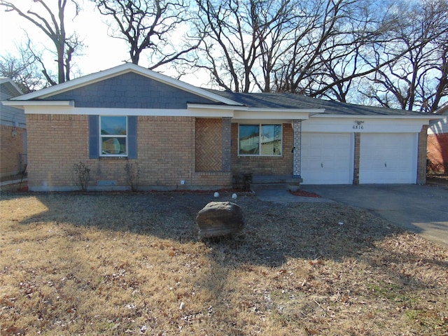 single story home featuring a garage