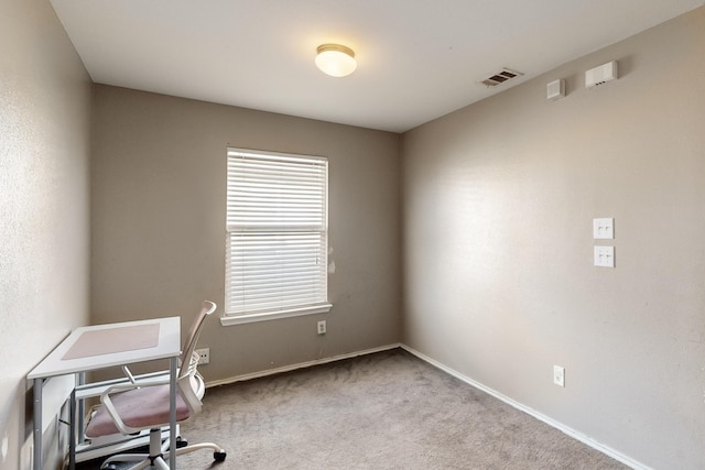 office space with light colored carpet