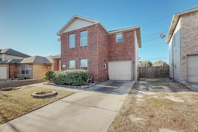 view of front facade with a garage and a front yard