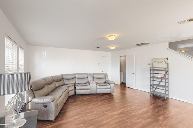 living room with dark wood-type flooring