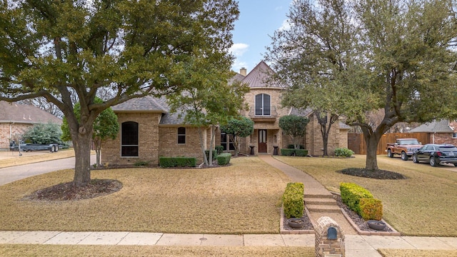 view of front of home with a front yard