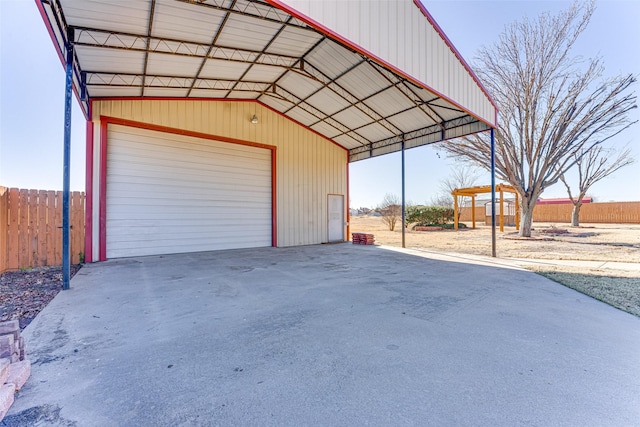 garage featuring a carport