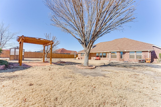 view of yard with a pergola