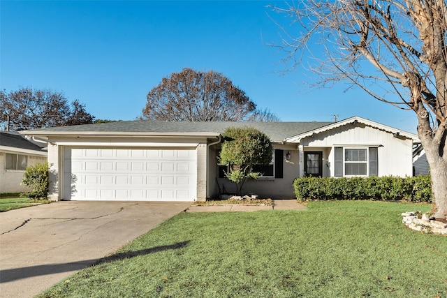 single story home featuring a garage and a front lawn