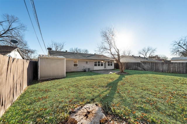 view of yard featuring central AC and a patio area