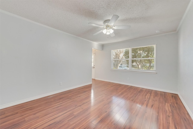 unfurnished room with crown molding, hardwood / wood-style flooring, a textured ceiling, and ceiling fan