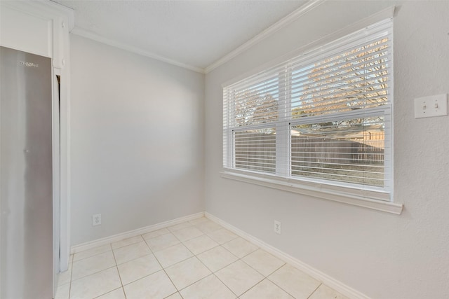 tiled empty room with crown molding