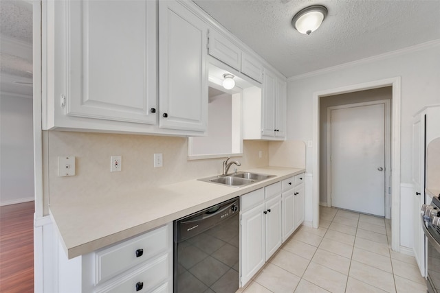 kitchen with light tile patterned flooring, sink, white cabinetry, a textured ceiling, and dishwasher