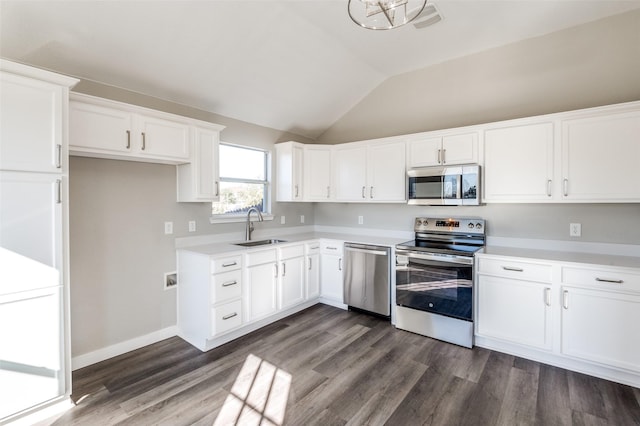 kitchen with white cabinetry, stainless steel appliances, dark wood-type flooring, and sink