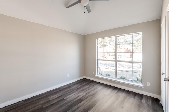 unfurnished room with dark wood-type flooring and ceiling fan