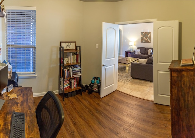 home office featuring hardwood / wood-style floors