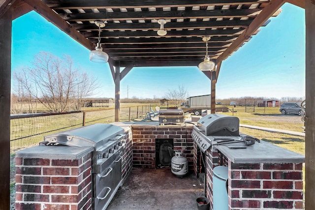 view of patio with fence, grilling area, area for grilling, and a pergola