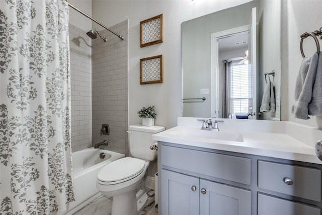 full bathroom with vanity, toilet, and shower / bath combo with shower curtain