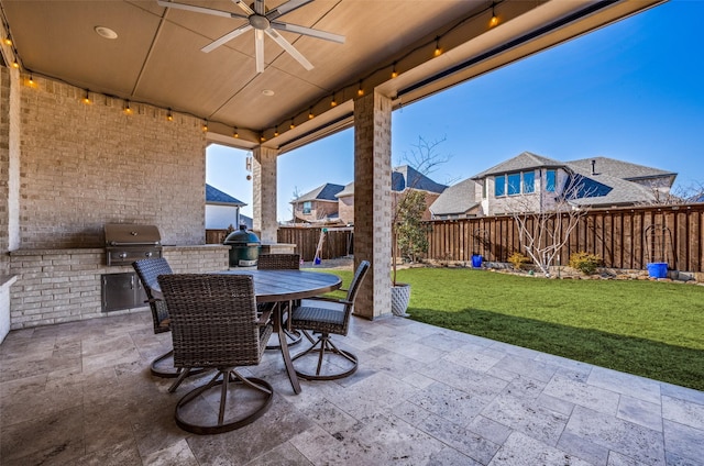 view of patio featuring ceiling fan and area for grilling