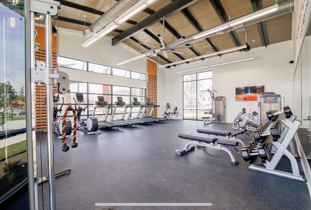 gym with high vaulted ceiling