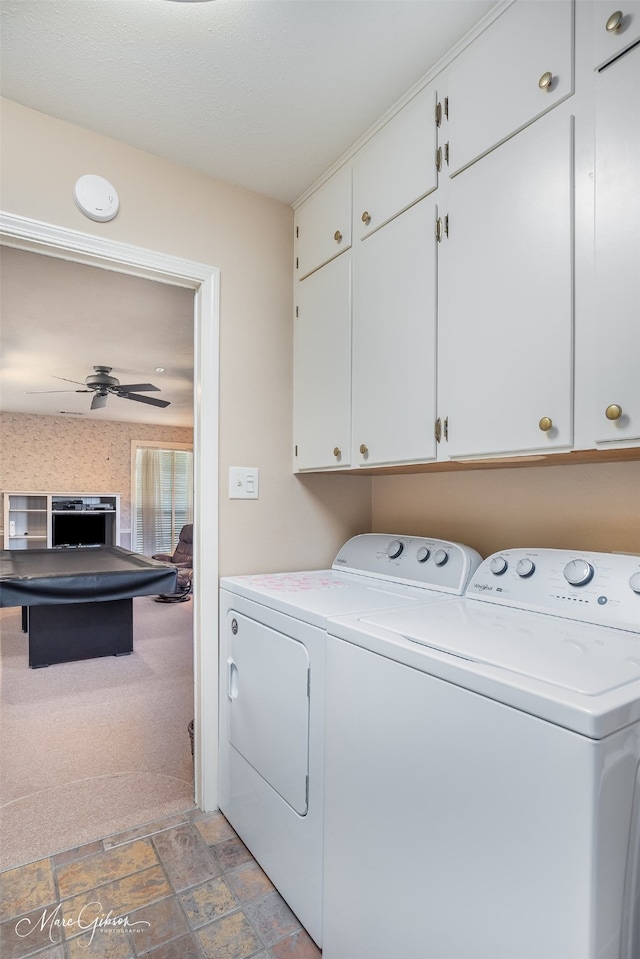 laundry room featuring cabinets, separate washer and dryer, and ceiling fan