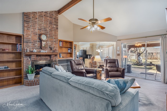 living room with high vaulted ceiling, beamed ceiling, ceiling fan, a brick fireplace, and light carpet