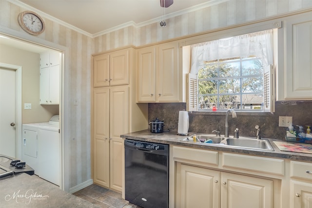 kitchen featuring sink, crown molding, washer and clothes dryer, black dishwasher, and cream cabinetry