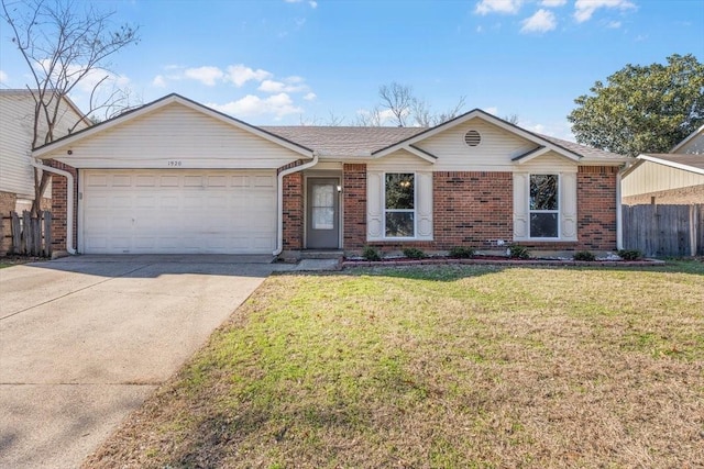 ranch-style home featuring a garage and a front yard