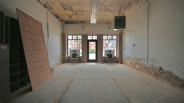 miscellaneous room featuring a high ceiling