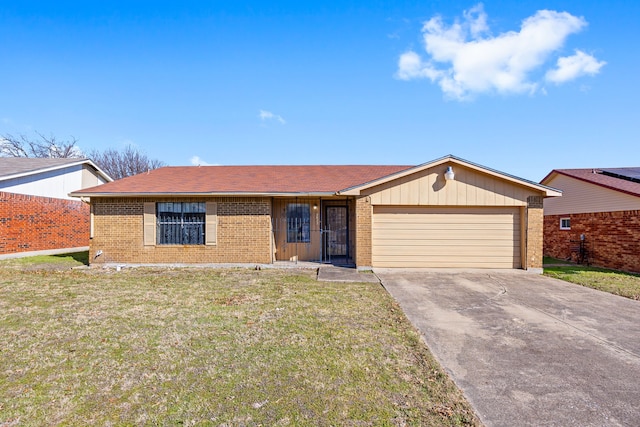 single story home featuring a garage and a front yard