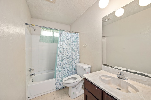 full bathroom featuring shower / bath combo, vanity, a textured ceiling, tile patterned floors, and toilet