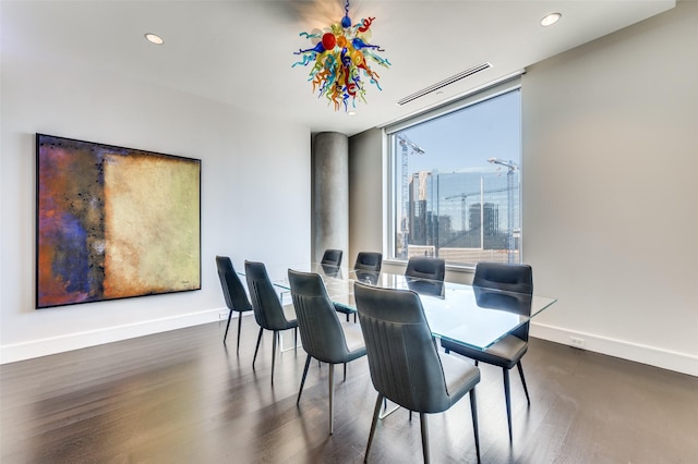 dining space featuring dark hardwood / wood-style flooring