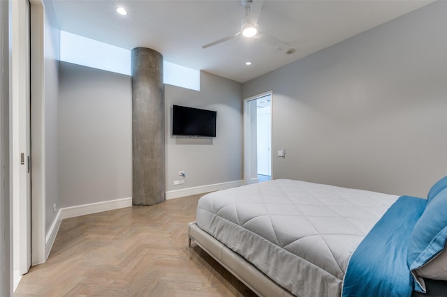 bedroom with light parquet floors and ceiling fan