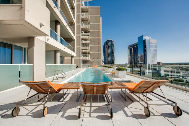 2408 Victory Park Ln Unit 1037, Dallas, TX 75219 - view of pool with a view of city