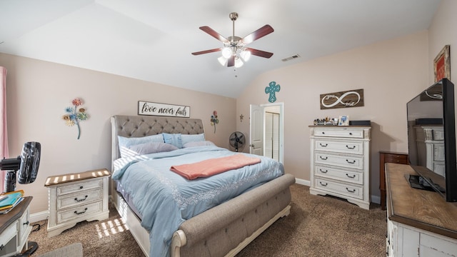 carpeted bedroom with ceiling fan and lofted ceiling