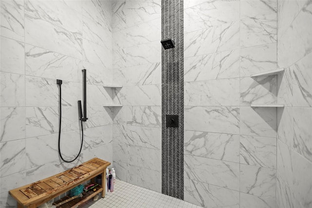 bathroom with a tile shower