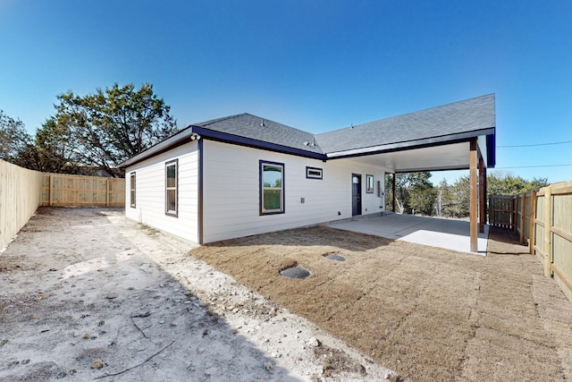 back of property featuring a patio