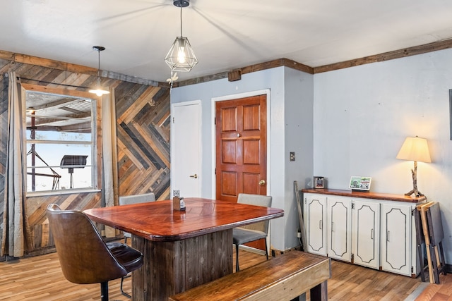 19538 Farm Rd Unit 197, Sumner, TX 75486 - dining area with light wood-style floors and wooden walls