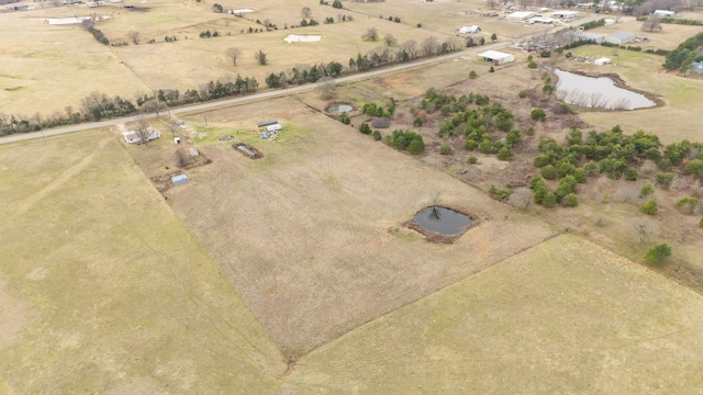 birds eye view of property featuring a rural view