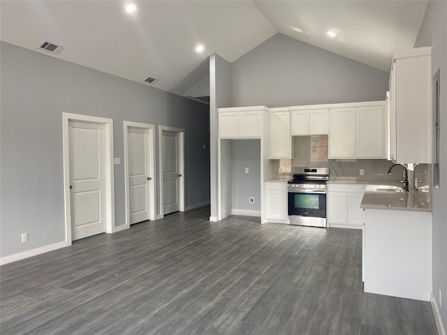 kitchen with sink, white cabinetry, electric range, high vaulted ceiling, and decorative backsplash