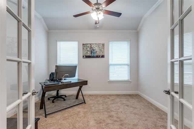 office area with french doors, light colored carpet, ornamental molding, and ceiling fan