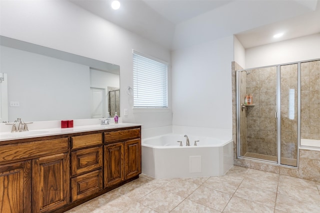 bathroom with vanity, separate shower and tub, and tile patterned flooring