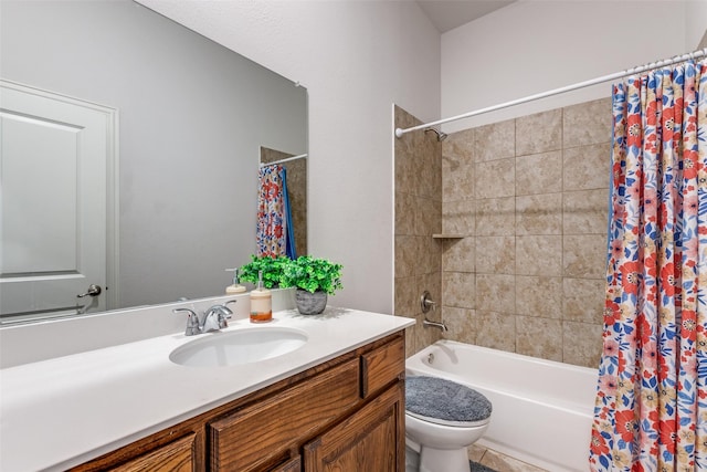 full bathroom with vanity, shower / tub combo with curtain, and toilet