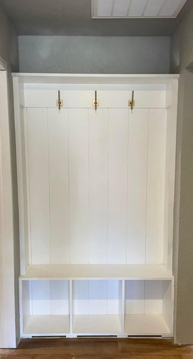 mudroom with hardwood / wood-style floors